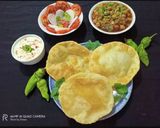 A picture of step 6 of Aloo Bhature.