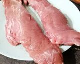 A picture of step 2 of Pork Tenderloin with Boursin® and Mushrooms.