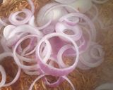 A picture of step 13 of Coconut party jollof rice.