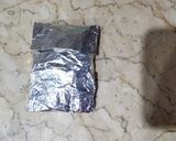 A picture of step 2 of Buttery Garlic Foil Pack.