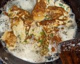 A picture of step 2 of Egg omelet with paratha.