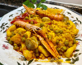 Foto del paso 11 de la receta: “ Arroz meloso” con anillas de pota
