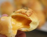 A picture of step 7 of Papa and Kids' Favorite Mini Cheesy Roll Bun.
