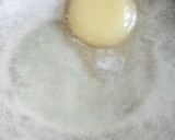 A picture of step 2 of Bomboloni.