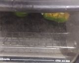 A picture of step 6 of Cheesy Rice Capsicum.