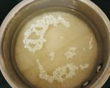 A picture of step 1 of Onion pulao Sindhi Special Bhughal Rice.