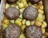 A picture of step 7 of Greek burgers with potatoes.