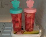 A picture of step 4 of Frozen Muskmelon Pepsicles in RoohAfza.