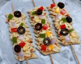A picture of step 2 of Penne pasta pizza sticks.