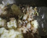A picture of step 2 of Steamed stuffed idli.