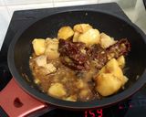 A picture of step 9 of Pork Belly With Arrowhead Root In XO Sauce.