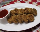 A picture of step 7 of Maharashtrian style Kothimbir vadi/Coriander Fritters/Dhaniya Rolls.