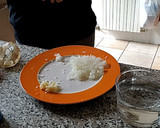 Foto del paso 2 de la receta: Arroz con calamares de lata