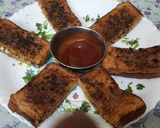 A picture of step 7 of Garlic Brown Bread with peri peri masala Dominos style sticks.