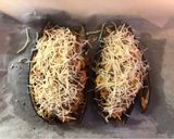 Foto del paso 6 de la receta: Berenjena gratinada rellena de pollo y cebolla