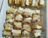 Foto del passaggio 6 della ricetta Spiedini di scamorza con guanciale in pane tostato