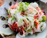 A picture of step 5 of Onion and Crab Sticks Salad.