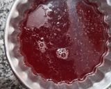 A picture of step 3 of Strawberry jello with fruits.