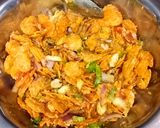 A picture of step 5 of Beguni ghoti gorom.