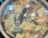 A picture of step 7 of Spanish omelet with spinach and cheese.