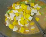 Foto langkah ke 7 dari resep Lodeh Labu Kentang Tahu.