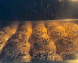 A picture of step 16 of Coconut Sesame Seeds Dinner Rolls.