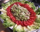 Une image de l'étape 8 de Salade de tomates,scarole,céleri et thon aux radis « fleurs ».