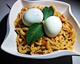 A picture of step 6 of Macroni and spaghetti with egg.