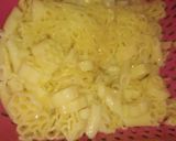 A picture of step 2 of Chicken cheese Maggie.