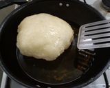 A picture of step 6 of Phulko Luchi/ Luchi in Bengali style.