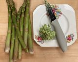 A picture of step 1 of Asparagus in wild garlic and lemon butter.
