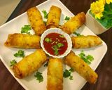 A picture of step 4 of Chicken Roll with white Sauce.