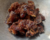 A picture of step 1 of Dry coconut Dates Delight.