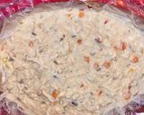 A picture of step 7 of Slow Cooker Creamy Chicken and Wild Rice Soup.