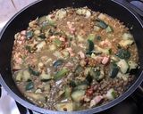 Une image de l'étape 12 de Lentilles brunes au lard, courgettes, pancetta et épices.