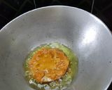 A picture of step 2 of Brinjal Fry.