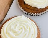 A picture of step 16 of Banana White Chocolate chips Cupcake with Citrus Buttermilk Frosting.