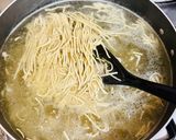 A picture of step 4 of Egg noodles in chicken broth.