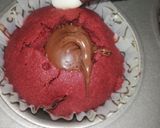 A picture of step 6 of Red Velvet çhoçolate inside Cupcakes with cream cheese frosting.