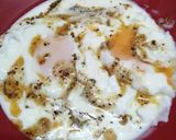 A picture of step 4 of Turkish style: poached eggs with yogurt.