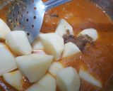 A picture of step 4 of Anday Aloo !.