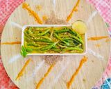 A picture of step 2 of Green Chilli Pickle with lemon juice.