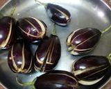 A picture of step 1 of Masala egg plant.