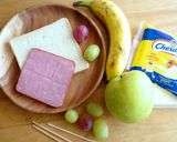 A picture of step 1 of Fruit, Cheese, and Ham Sandwich Skewers.