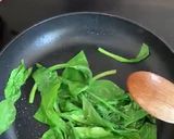A picture of step 3 of Spinach saute - one more green on a plate.