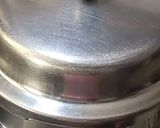 A picture of step 4 of Matar pulao.