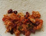 A picture of step 6 of Mexican chicken enchiladas.