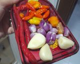Foto langkah ke 2 dari resep Tumis Bunga dan Daun Pepaya.
