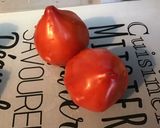 Une image de l'étape 1 de Tomates aux herbes,ail et parmesan.