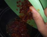 A picture of step 3 of Yellow rice with sauce.